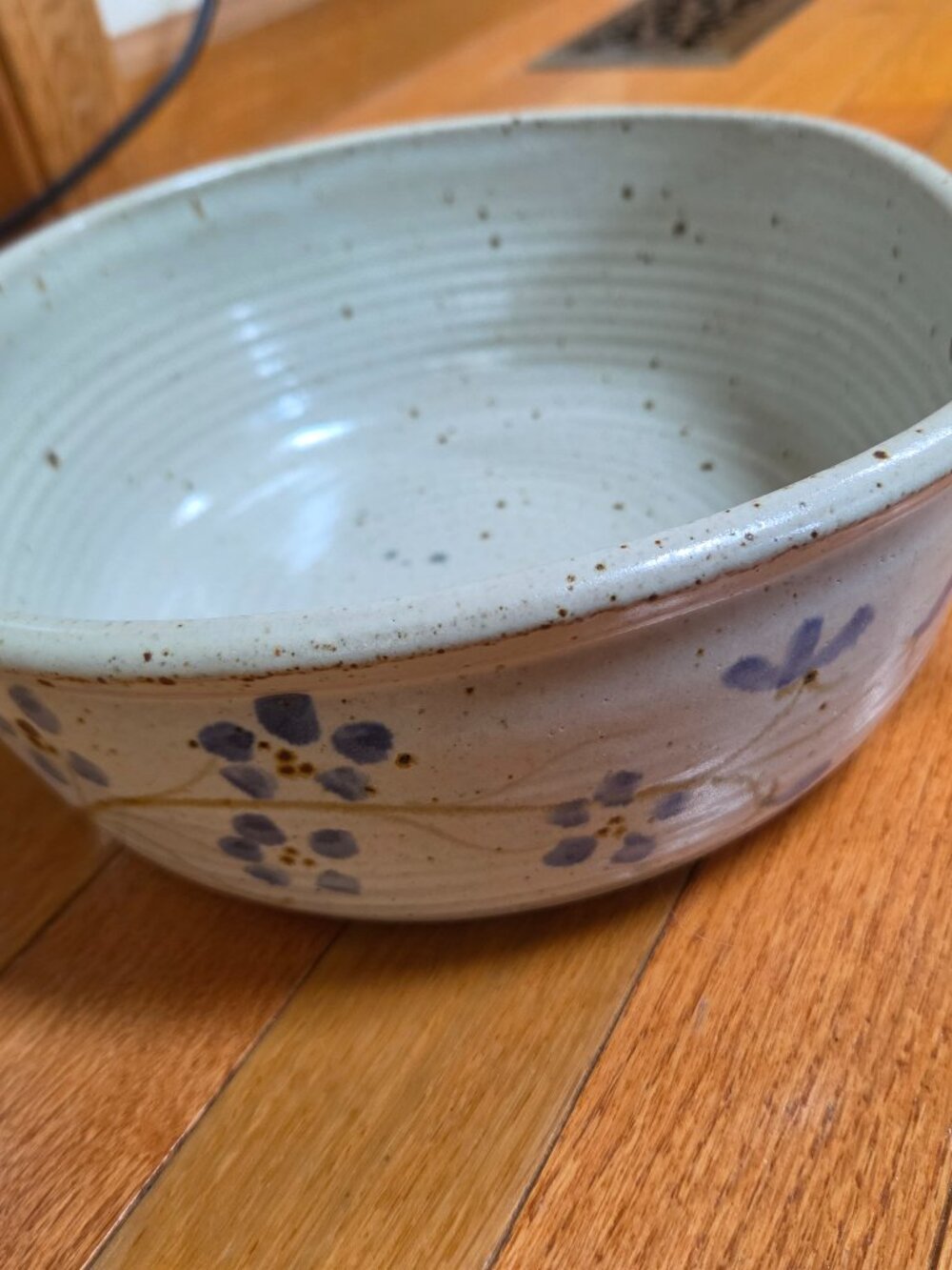 charming handmade stoneware bowl hand painted motif with side loop handles